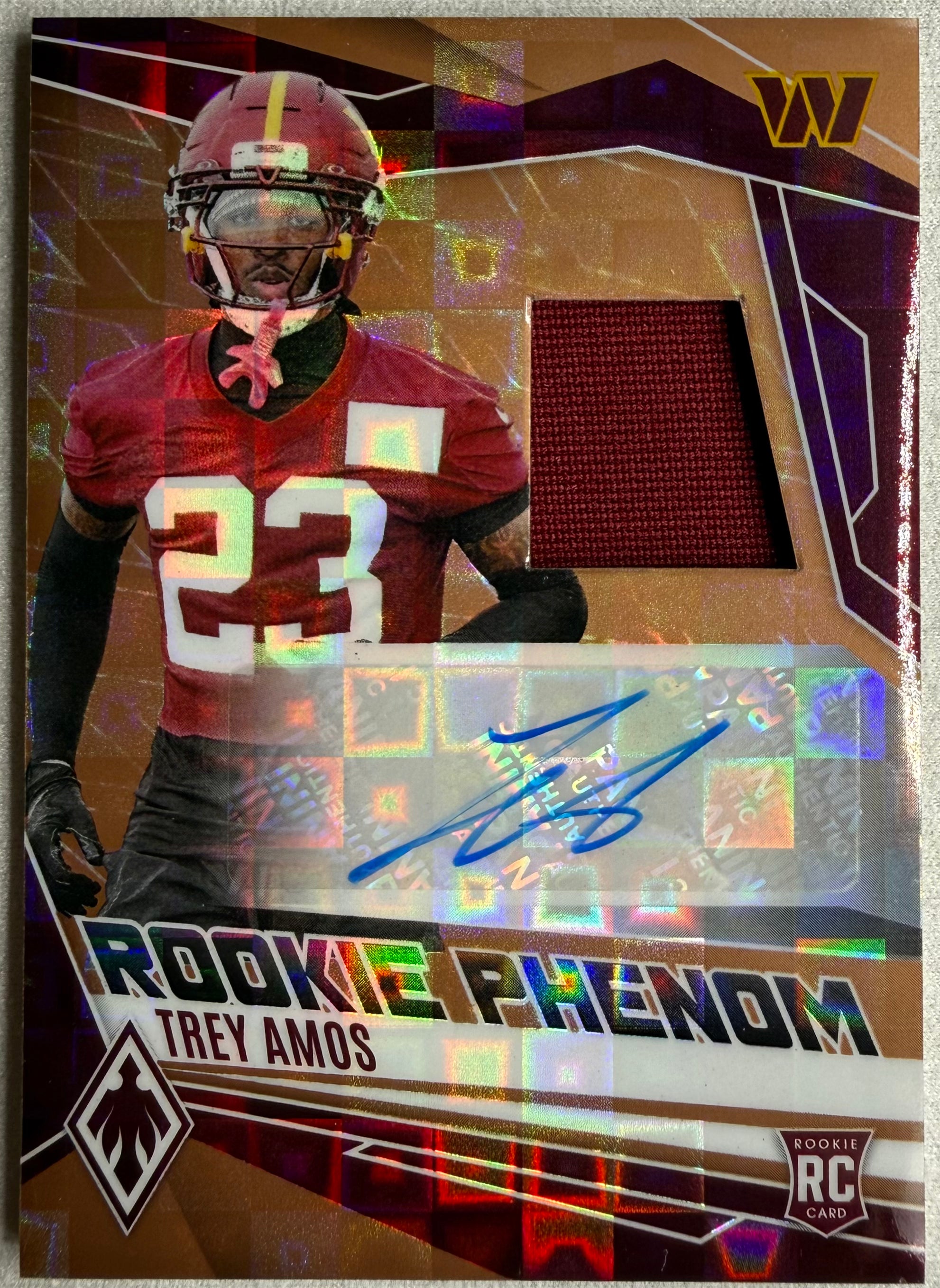 2025 Panini Phoenix Rookie Phenoms Patch Auto Bronze Pandora /199 - Trey Amos #RPJ-TAS