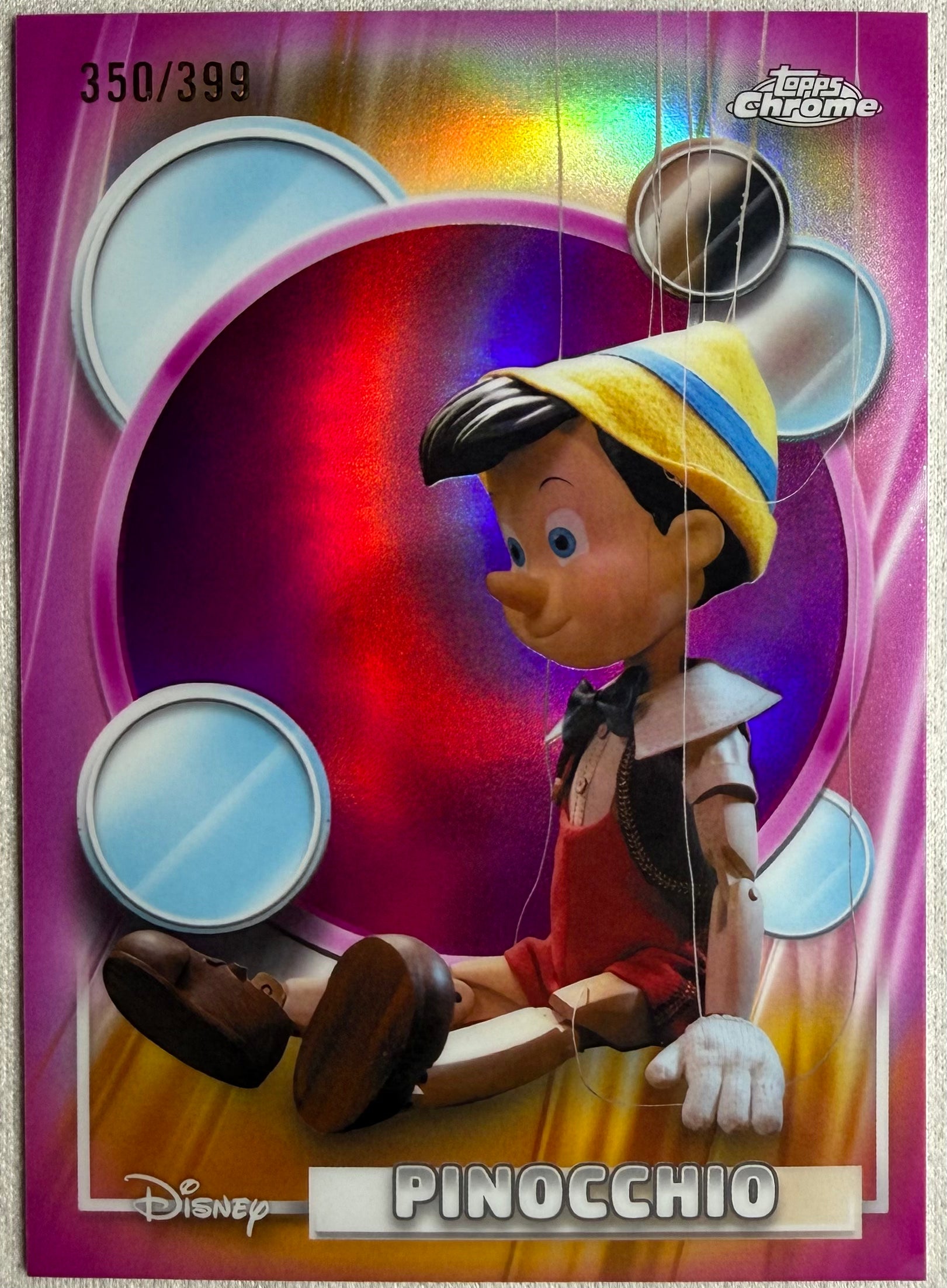 Pinocchio 2026 Topps Chrome Disney Pink Refractor /399 #95